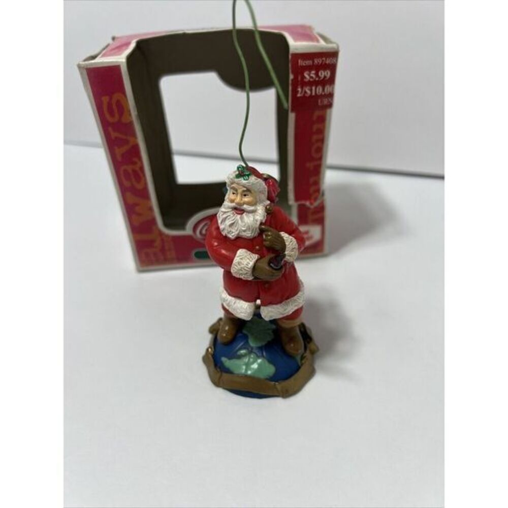 1992 Santa Claus Holding Bottle of Coca-Cola Standing on World Ornament